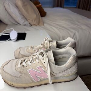 New balance 574 pink sneakers worn as pictured